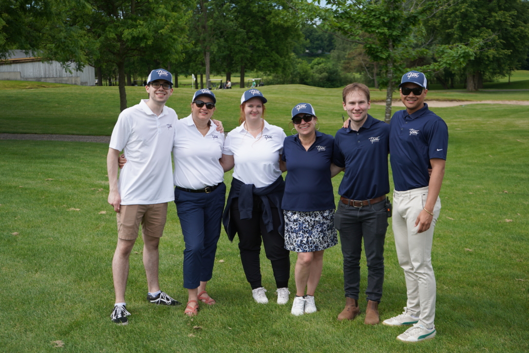 TPM team at a golf tournament